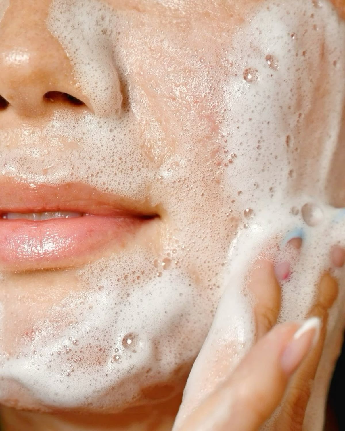 Close-up of facial cleansing foam on skin