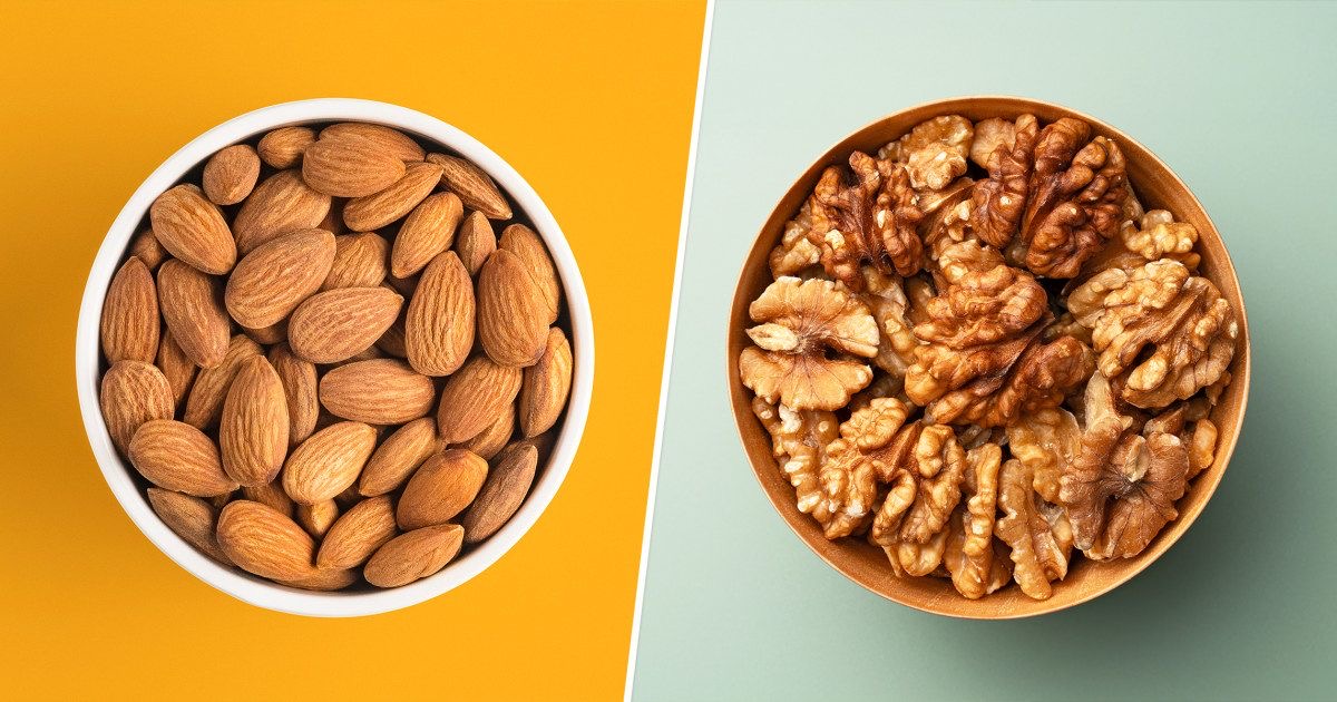 Separate bowls of almonds and walnuts