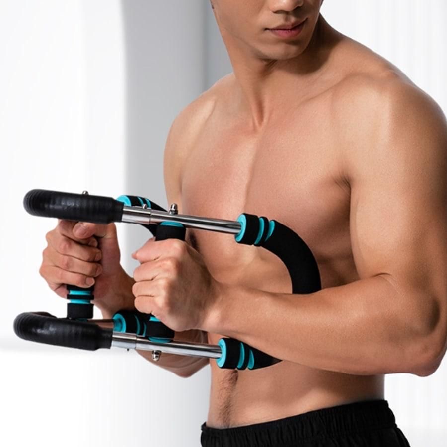 Man holding a compact chest resistance exerciser